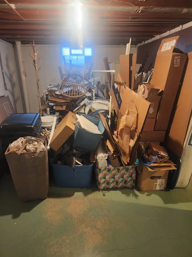 Roll-off dumpster container at job site for Construction Dumpster Rental in Cambridge